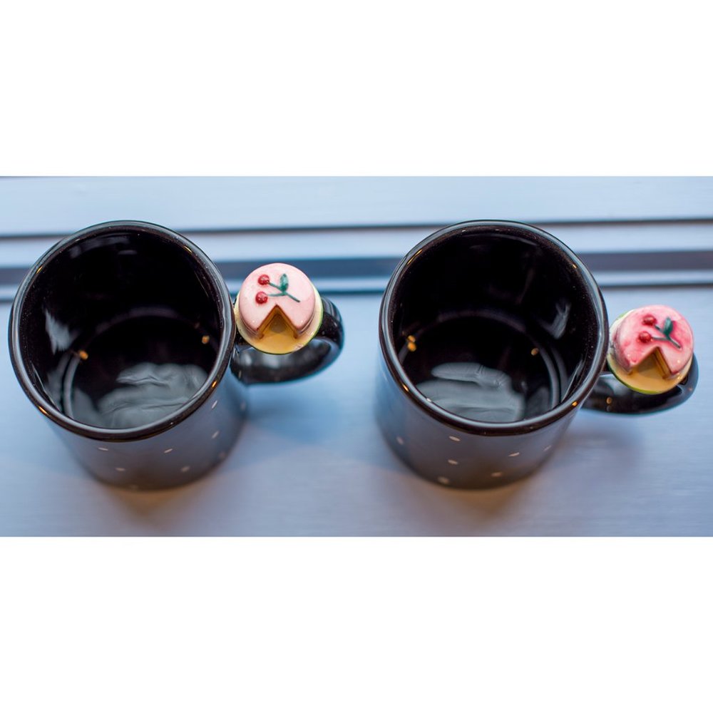 **Two** adorable mugs with cake on handle